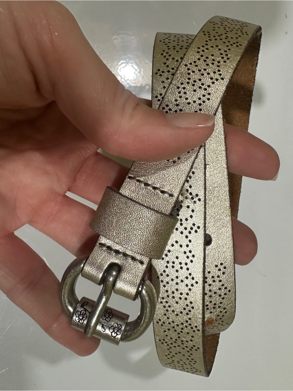 Fossil Metallic Gold Perforated Leather Belt with Floral Buckle